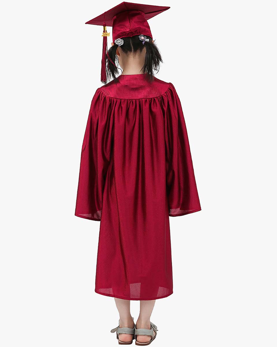 Girl Wearing Graduation Cap And Gown High-Res Stock Photo - Getty Images